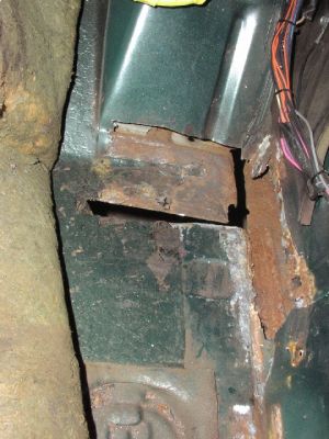 Floor prepared
This the floor, passenger side.  I cut out as much as I could that was bad and then added metal from here.
Keywords: rust weld welding