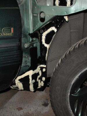 Right hand side complete
This is the right hand side, completed.  I painted with POR-15 and used a 3M seam sealer to seal up any gaps.  This all gets covered with the fender.
Keywords: rust weld welding