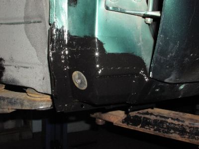 LH side painted
This is the left hand side after painting.  I pushed the sunroof drains into the car when I was working on it, and then popped them out when done.
Keywords: rust weld welding