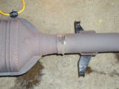 This shows how I cut the old converter off using a pneumatic tool with a cut-off wheel.
Keywords: converter catalytic exhaust random