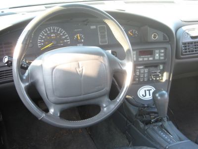 Instrument cluster and steering wheel.
Keywords: steering wheel gauges tachometer odometer speedometer shifter gear knob