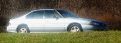 Sunshine on my Bonnie making her even more purty!
Keywords: exterior doors wheels tires side view