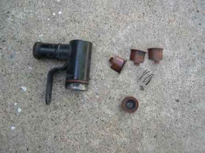 Heater Hose Assembly
Pic of pieces coming out of heater hose elbow attachment to tensioner assembly
