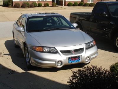 The front
The front of this beautiful car! I got my custom license plate with my name on the front. It was supposed to be for a 2002 Pontiac Grand Prix I was supposed to get a while back before this but things didn't work out.  
