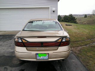 Stock/Before
Keywords: 22" Blacked out tinted black pearl custom HID's  Bonneville SE