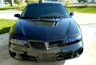 Just out of the paint booth
Keywords: 22" Blacked out tinted black pearl custom HID's  Bonneville SE