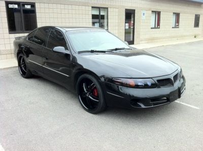 Bonneville
Keywords: 22" Blacked out tinted black pearl custom HID's  Bonneville SE