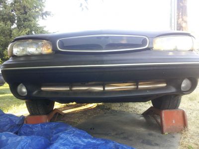 Bumper grille after
Added some aluminum sheeting which I got at ACE hardware..a few screws on the under side..will most likely be painting it black eventually ;)
