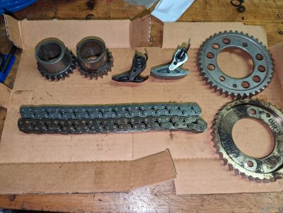 Damaged timing components from LG3 engine.
The engine had a slight rattle from the front housing since I owned the car. The rattle got slightly worse, and the engine stopped running. The cam was still turning but the cam sensor signal and crank sensor signal were too far out of sync for the ignition to fire correctly. 


