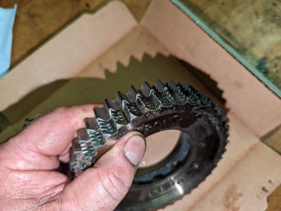 Damaged timing components from LG3 engine.
The engine had a slight rattle from the front housing since I owned the car. The rattle got slightly worse, and the engine stopped running. The cam was still turning but the cam sensor signal and crank sensor signal were too far out of sync for the ignition to fire correctly. 


