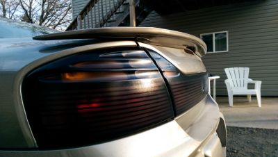 Smoked Out 
Decided to smoke the tail lights, this is the outcome. 
Keywords: Smoked tail lights 2000 Bonneville SSEi Tan Plasti Dip
