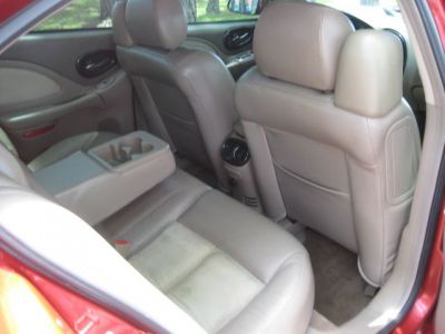 I really want the center console bin the older seats have but the texture is different, but I can get one from an Aurora if I swap out the cup holders cuz there lighter colored on the Olds
